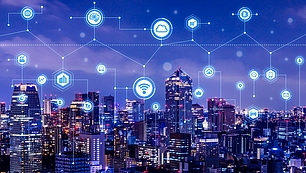 5G New Radio and Network Planning Connected city skyline with network icons representing 5G New Radio and mobile connectivity