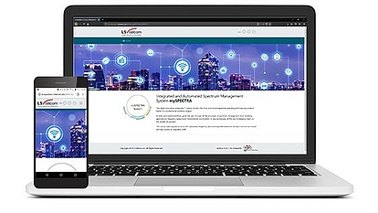mySPECTRA A laptop and smartphone displaying the LS telcom website featuring an integrated and automated spectrum management system with a city skyline background and network icons.