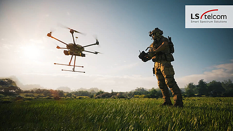 Spectrum Superiority for Defense Forces Soldier controls a drone in the field, illustrating spectrum operations for defense mission planning.