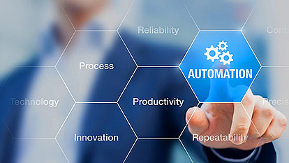 Automation Possibilities - Streamline Repetitive Tasks with Macros Businessman pushing a button labeled "Automation" representing the automation of processes using macro language.