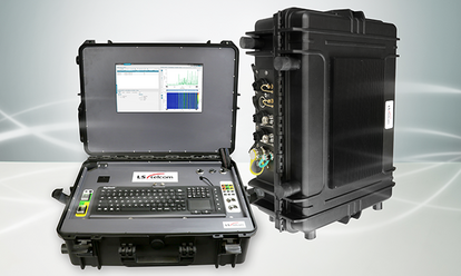 LS OBSERVER A rugged portable spectrum analyzer system in a hard protective case. The open unit on the left shows a built-in keyboard, control panel, and a screen displaying spectrum analysis graphs. The closed unit on the right shows various connection ports on the side.